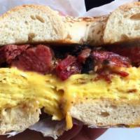 Pastrami, Egg and Cheese Roll · Smoked and cured beef.