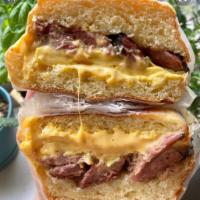 Pastrami, Egg and Cheese Hero · A long sandwich on a roll. 