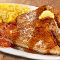 French Toast · Comes with eggs and home fries.