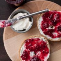 Bagel with Cream Cheese and Jelly · Boiled and baked round bread roll.