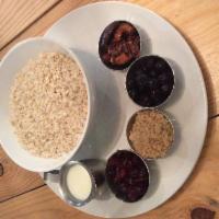 Oatmeal · Oatmeal served with mixed nuts, craisins, brown sugar, blueberries and cream. A wonderful wa...