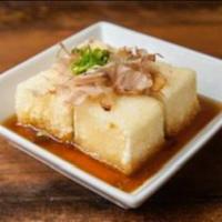 Agedashi Tofu · Deep fried tofu with tempura sauce and scallion.
