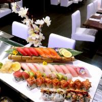 Sushi for 2 · 16 pieces of assorted sushi, shrimp tempura roll, rainbow roll and spicy girl roll. Served w...
