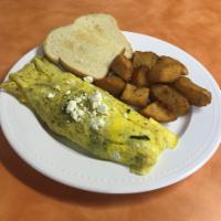 Spinach & Feta Omelettes · Spinach, garlic, feta cheese and egg. Served with toast and home fries.