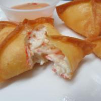 Crab Rangoon  · Crispy wonton stuffed with cream cheese, celery, onions, carrot and imitation crab. Served w...