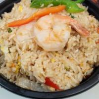 Spicy Basil Fried Rice · Spicy fried rice with egg, onions, bell peppers and basil.