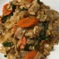 Spicy Noodle · Spicy rice noodles sautéed with egg, carrots, onions, scallion and basil leaves in spicy sau...