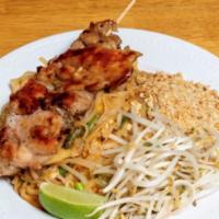 Pad Thai Garlic Chicken · Stir-fried rice noodles with egg, bean sprouts, scallions, ground peanuts and topped with gr...