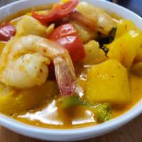 Mango Shrimp Curry · Shrimp with pineapple, fresh mango, bell pepper and broccoli cooked with yellow curry sauce....