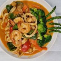 Seafood Curry · Shrimps, scallops, squids with asparagus, broccoli, carrot in cream and sweet chili paste sa...