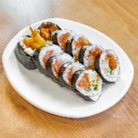 Spicy Salmon Roll · Spicy salmon, cucumber, shrimp tempura, shredded onions, marinated jalapeno and unagi sauce.