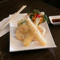 Shrimp Tempura App · 2 pieces. Batter-fried shrimp and vegetable in tempura sauce.