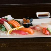 Sushi and Sashimi Combo · 8 pieces of sashimi, 5 pieces of sushi and Salmon roll. Served with miso soup and salad.