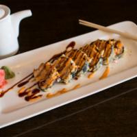 Godzilla Roll · Batter fried. Roll of tuna, salmon, yellowtail and rice with special spicy sauce.