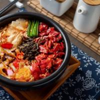 Pickled pepper and pork intestine rice noodles 老坛泡椒肥肠米线 · 