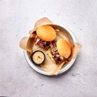 2 BBQ Beef Sliders · Slowly smoked hand-pulled BBQ beef doused in our homemade bbq sauce served in soft potato sl...