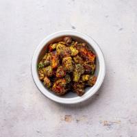 Fried Brussel Sprouts · Freshly fried baby brussel sprouts with a yuzu balsamic glaze