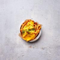Cheese Fries · Crispy hand cut fries with our homemade cheese sauce.