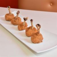 Lollipop Chicken · Our breaded drumlettes is browned to a golden crisp, delicately covered with Japanese panko....