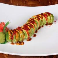 Dragon Roll · Spicy salmon, cucumber, topped with avocado, sweet spicy sauce.