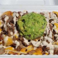 Carne Asada Fries · Hand-cut fries smothered in cheddar Jack cheese and topped with asada marinated steak, asada...