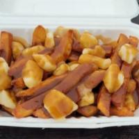 Poutine · Our awesome hand-cut fries served with savory beef gravy and Wisconsin cheese curds. Add shr...