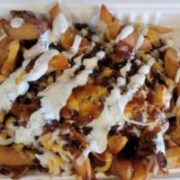 Bacon Cheese Fries Special · House-cut fries smothered in melted cheddar and jack cheese, topped with bacon. Choice of 1 ...