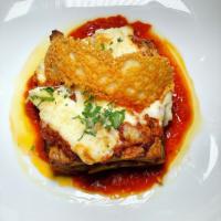 Lasagna · Braised beef, bechamel sauce, and Parmesan.