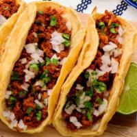 Chorizo Taco · Seasoned chopped or ground mexican pork sausage in a soft, corn taco. Topped with, cilantro ...