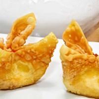 Crab Rangoon  · 8 pieces.