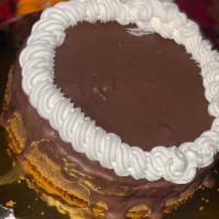 Chocolate Ganache Cheesecake Cake · Served with tasty coco chocolate cheesecake with Oreo and gram cracker crust. Smooth ganache...