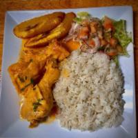 Chicken Stew · W/ Yellow/ White Rice, Fried plantains and Home-made salad 
