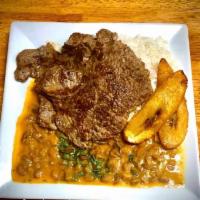 Grilled Steak · W/ Rice, Brown Or Lentil Beans  and Fried plantains. 

