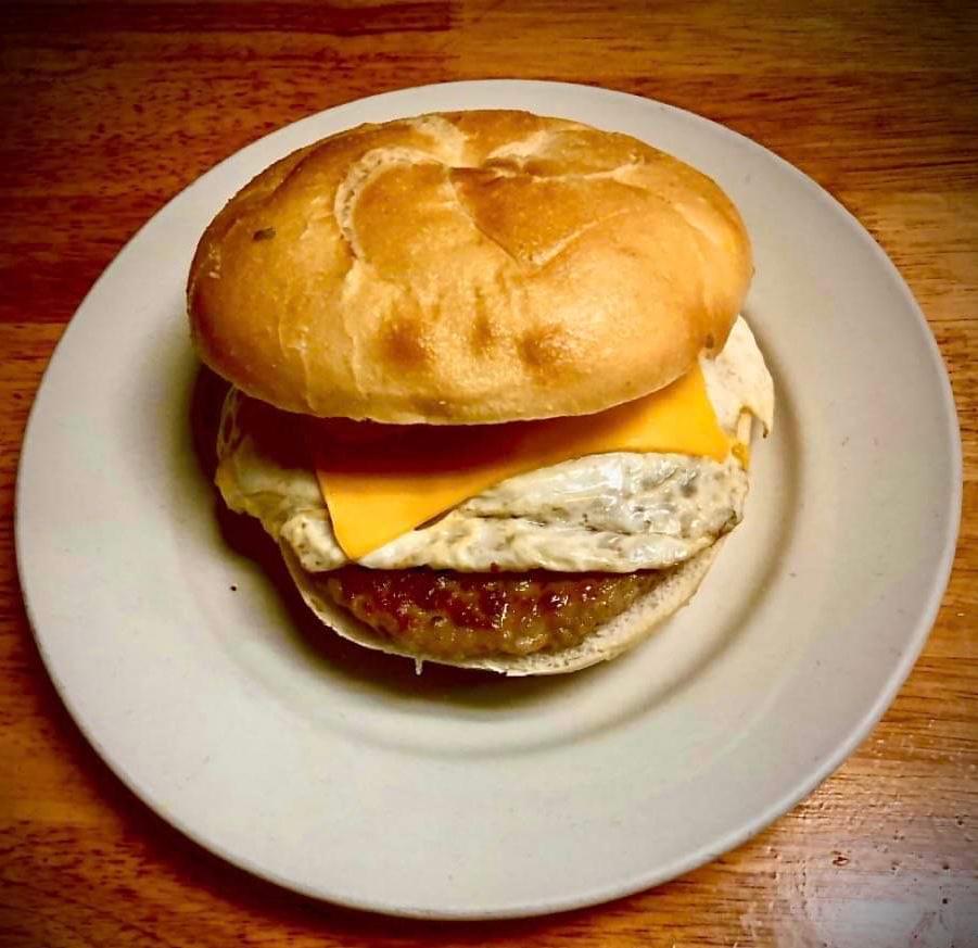 Sausage Egg & Cheese  · Sausage Egg & Cheese on a roll or bagel with two eggs 