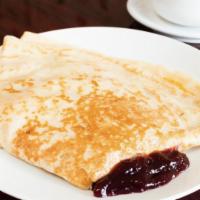6. Monte Cristo Crepe · Chicken, ham, Swiss cheese, mustard and mayo with a raspberry jam on the side.