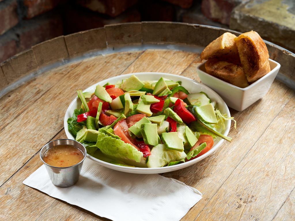 House Salad · Mixed greens, avocado, green & red peppers, red onions, cucumbers & tomato with choice of dressing.