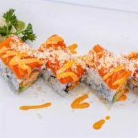 Sakura Special Roll · Spicy crab, avocado with fresh salmon, crunchy, and spicy mayo on top.