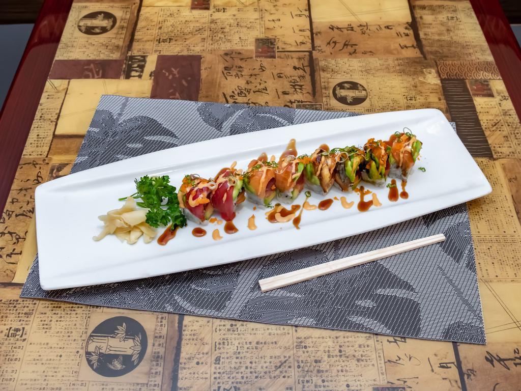Tiger Special Roll · Tuna, salmon and avocado inside tuna, salmon, eel, and avocado on top, served with eel sauce masago, scallion, and crunchy with spicy mayo.