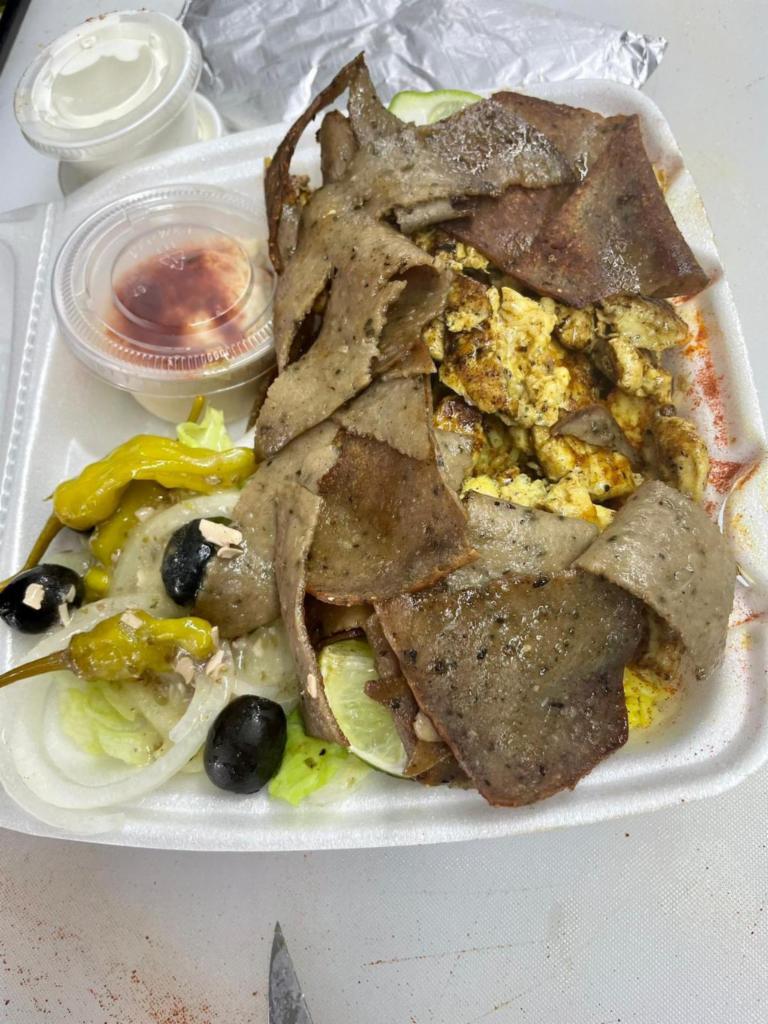 Combo Gyro Platter · Chicken and beef gyro (halal) rice, Greek salad, hummus, pita, corn.