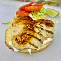 Grilled Chicken Sandwich · Cooked on a rack over a grill. 