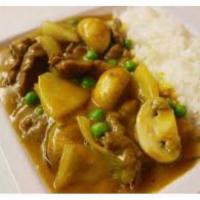 Curry Beef · Served with white rice. Served with arroz blanco. Hot and spicy.