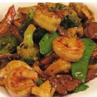 Triple Delight · Chicken, beef and shrimp with mixed vegetables.