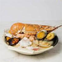 Seafood Soup · Savory soup with mixed seafood.