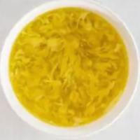 Egg Drop Soup · Served with fried noodles with fideos fritos.