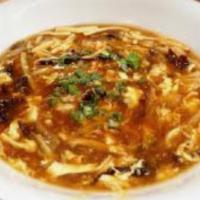 Hot Sour soup · Served with fried noodles with fideos fritos. Hot and spicy.