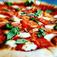 Margherita Pizza · Sauce, Sliced Tomato, Basil and Fresh Mozzarella
