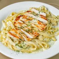 Fettuccini Allredo with Chicken · Served with a side of bread.