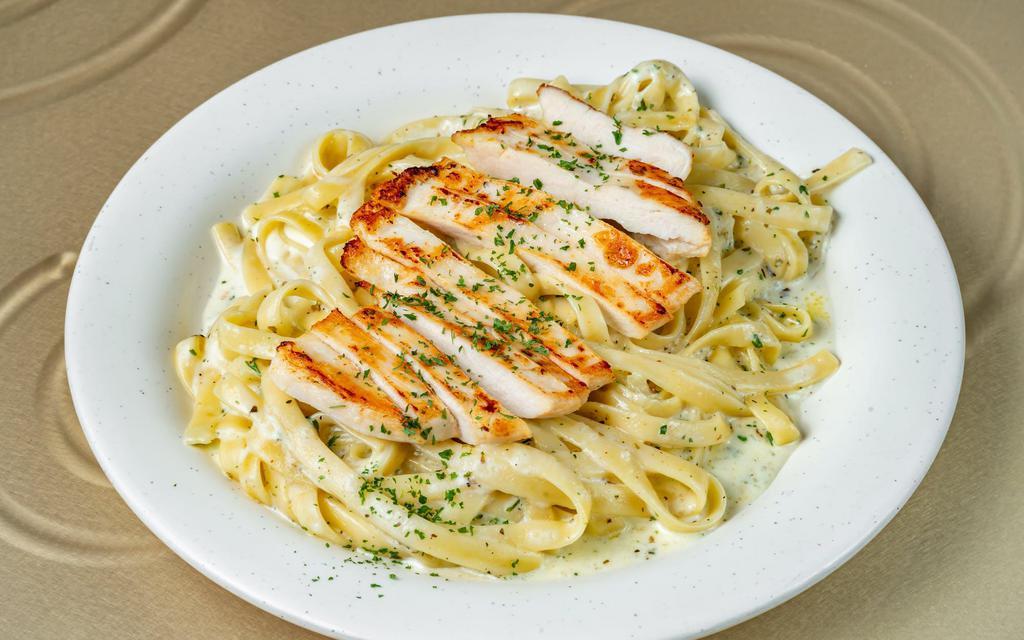 Fettuccini Allredo with Chicken · Served with a side of bread.
