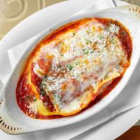Lasagna · Served with a side of bread.