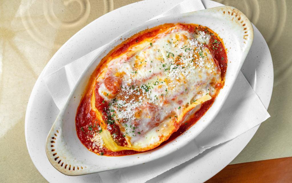 Lasagna · Served with a side of bread.